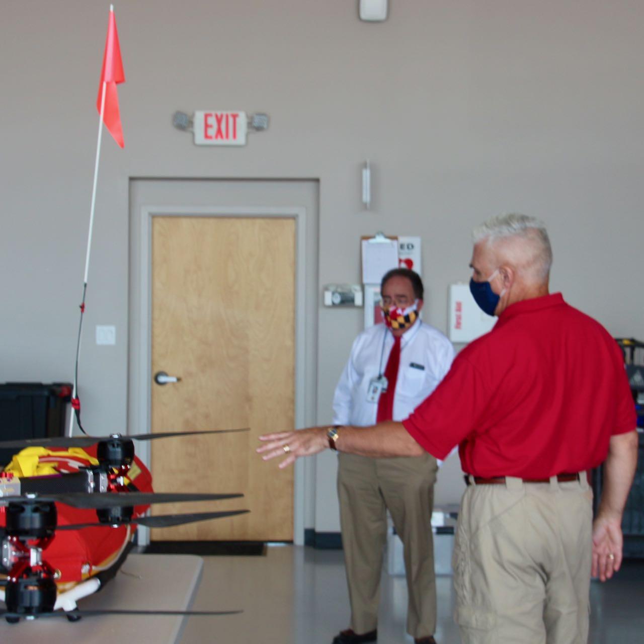 Chancellor Jay Perman speaks to Matt Scassero of the University of Maryland Unmanned Aircraft System (UAS) Test Site